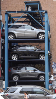 4 strati dell'elevatore dell'automobile sollevano il motociclo di controllo 3000KG di VVVF
